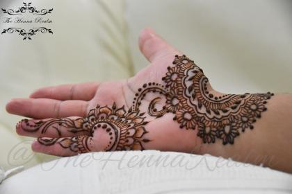 Hand design by The Henna Realm
